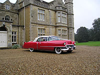 Classic American Red & white Cadillac hire